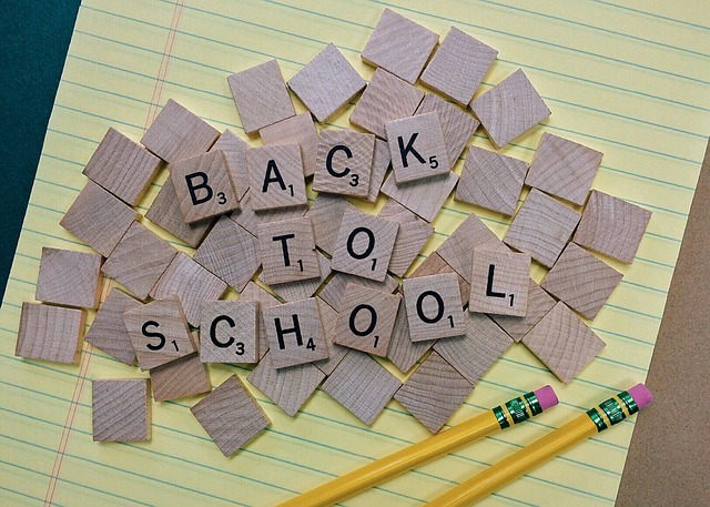 Scrabble letters on paper spelling Back to School